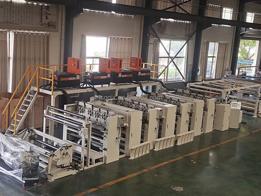 Machine automatique de laminage de tissus à base de colle à fusion chaude et de pulvérisation de poudre